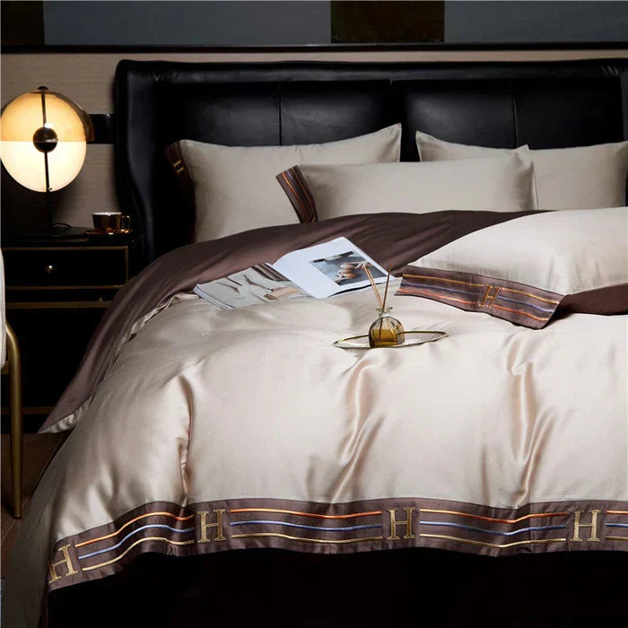 Luxury bedroom styled with embroidered satin duvet cover and pillowcases