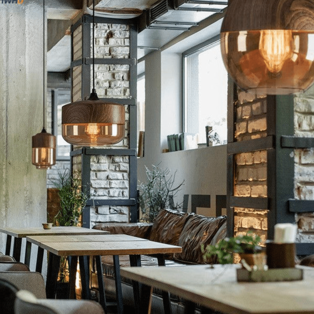 Indoor lighting showcase of the sleek glass shade hanging lamp turned on