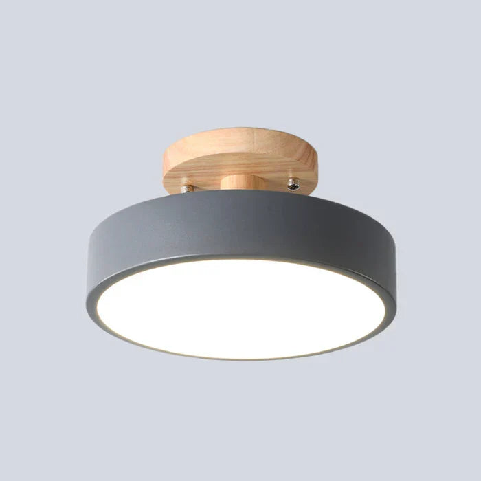 Close-up detail of the wooden accent on the scandinavian LED fixture for home decor