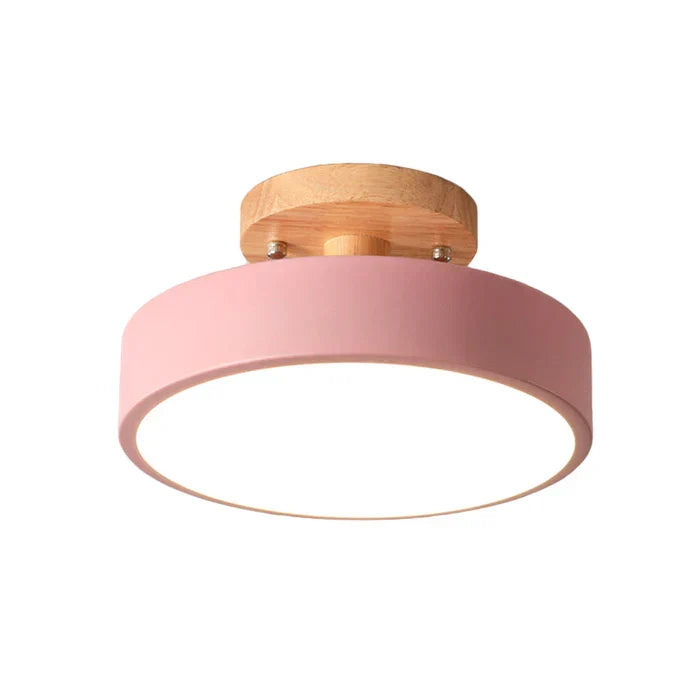 Modern nordic lamp illuminated in a stylish hallway, highlighting warm LED ceiling light