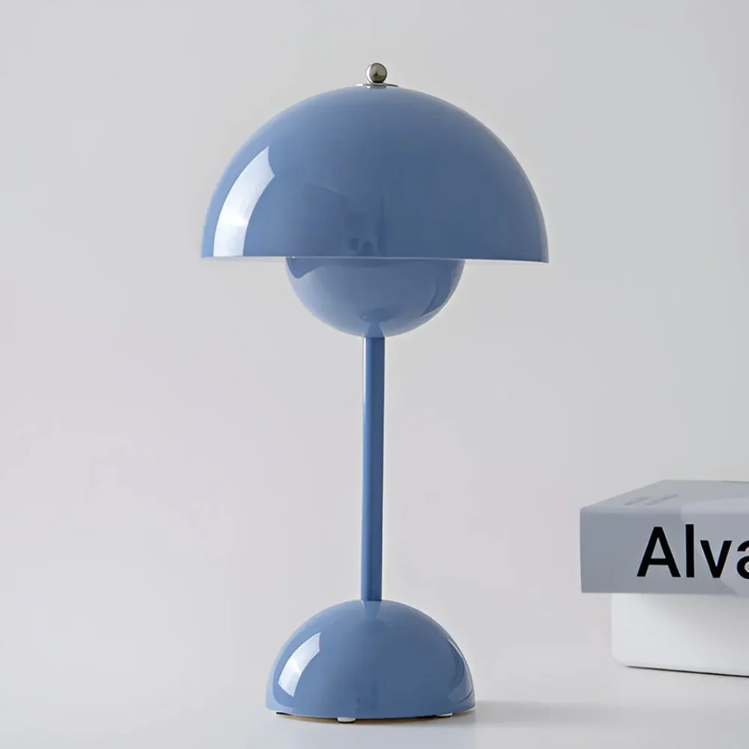 Minimalist scandinavian cordless table lamp providing warm ambient desk lighting