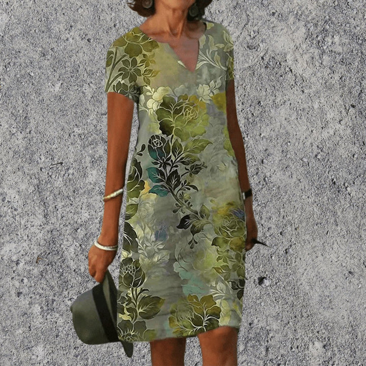 Full length shot of the everyday wear V-neck midi dress with botanical pattern