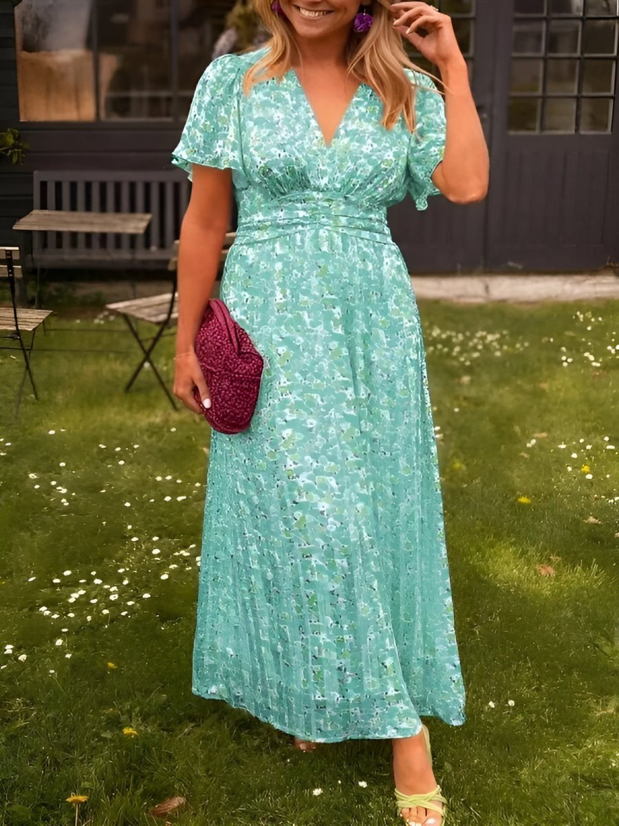Fabric texture and vibrant floral pattern detail on trendy women's cocktail maxi dress