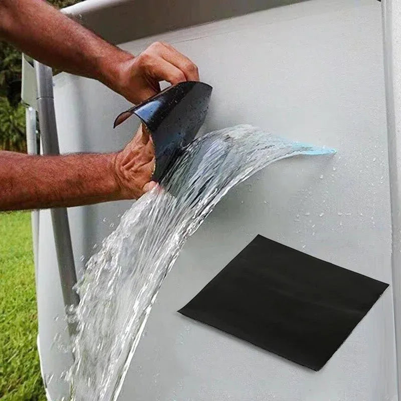 Close-up of black sealing tape blocking a water leak
