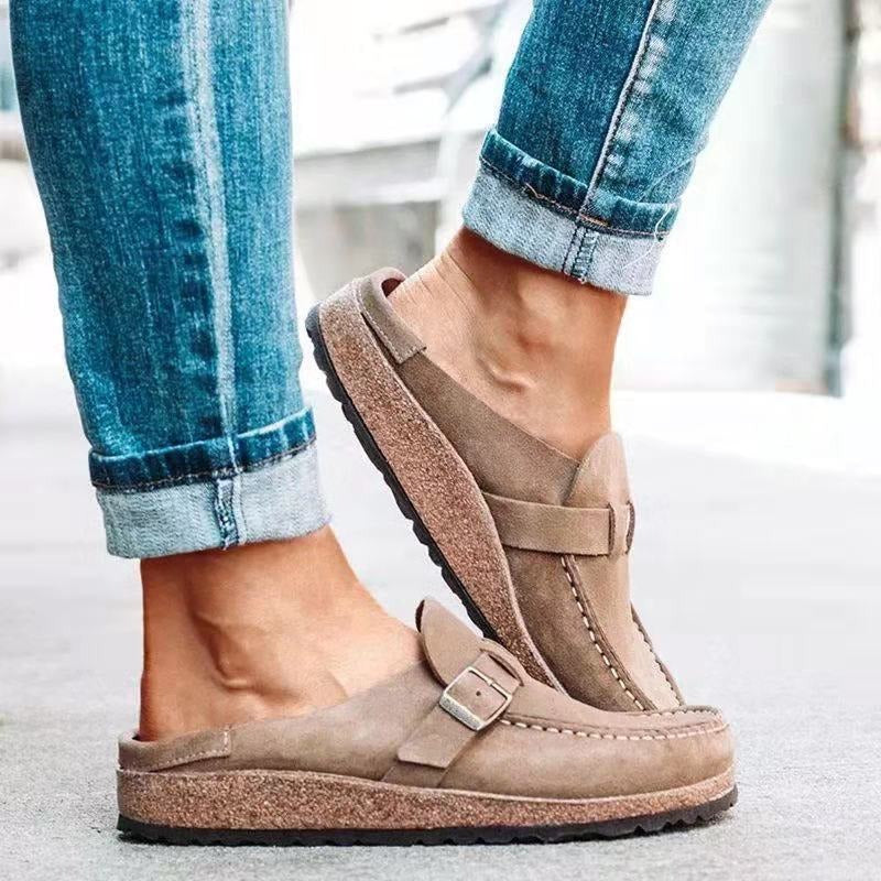 Close-up of stylish buckle on women comfortable loafers