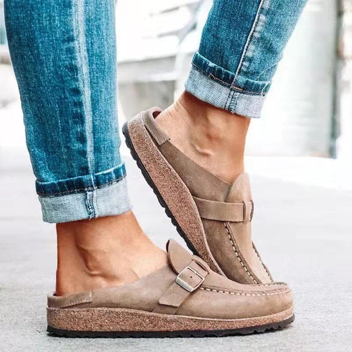 Close-up of stylish buckle on women comfortable loafers
