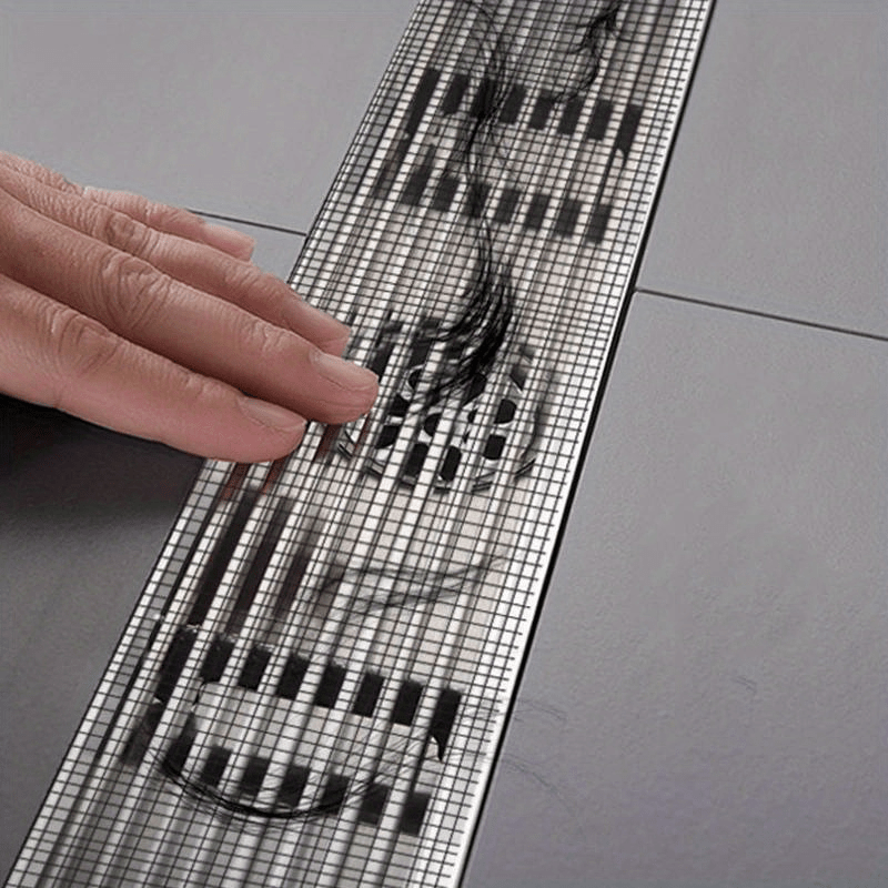 Pack of 5m drain protection grid mesh roll showing texture and adhesive backing