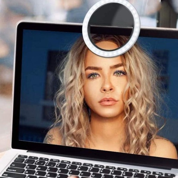 Rechargeable LED ring light showing adjustable brightness levels and color temperature modes