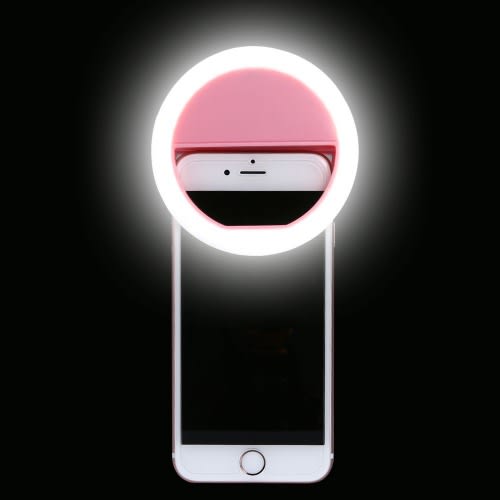 Pink portable selfie ring light mounted on a smartphone