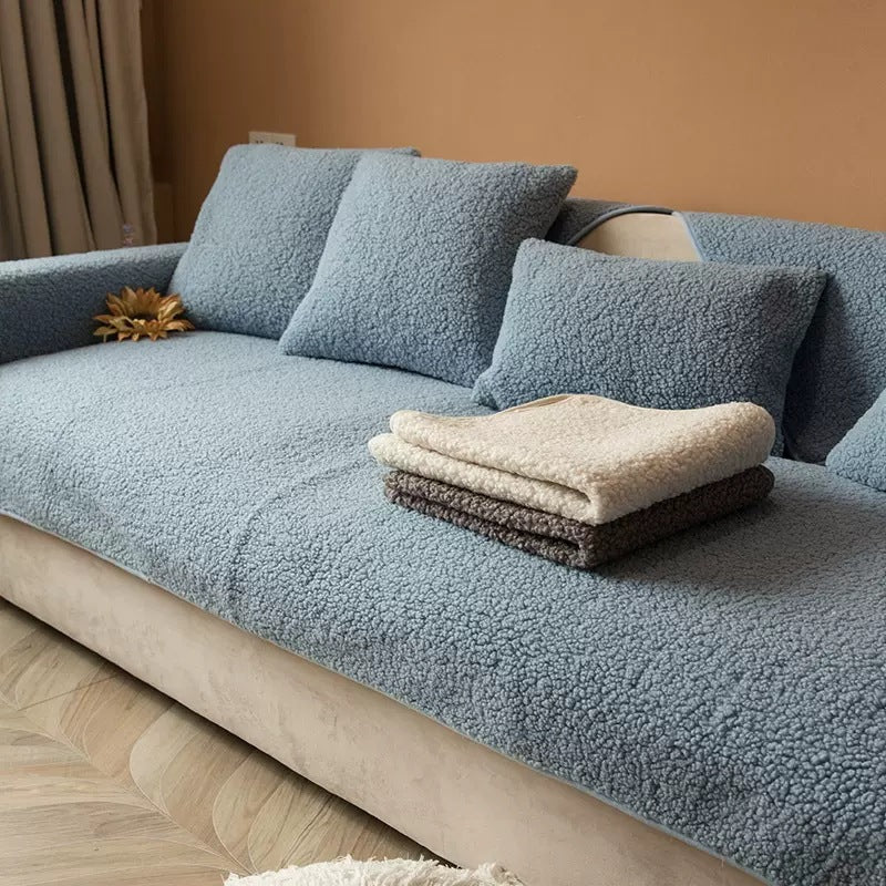 Plush non-slip sofa cover texture detail showing soft quilted fabric and pet-friendly couch protector design