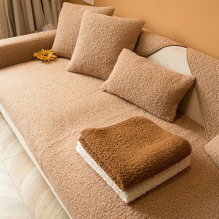 Back view of plush living room sofa cover showcasing secure non-slip backing for furniture protection