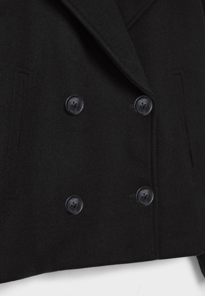 Trendy layering jacket combining classic tailoring with a cropped fit