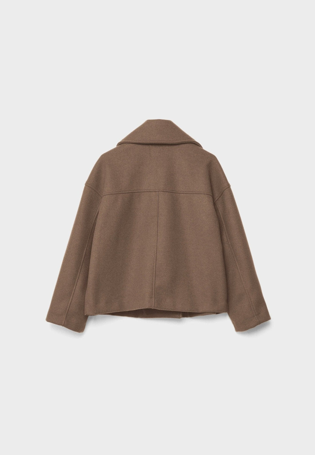 Sleek cropped winter jacket complementing various casual outfits