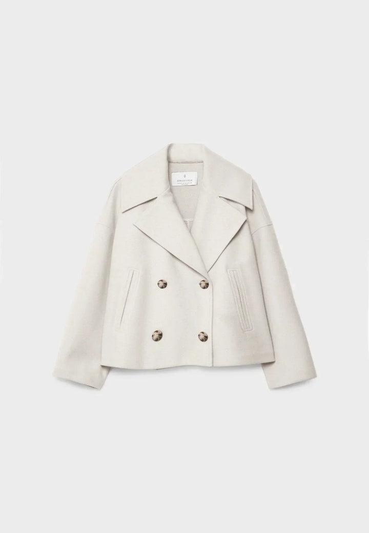White cropped double breasted jacket flat lay view