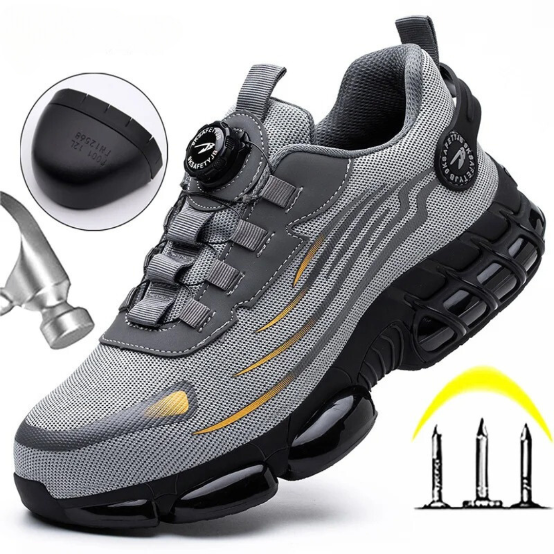 Men's grey steel-toe safety shoe displaying breathable mesh upper and protective features