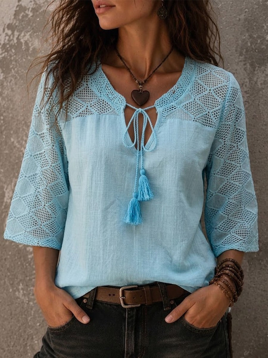 Model wearing light blue boho crochet trim V-neck tunic top from the front