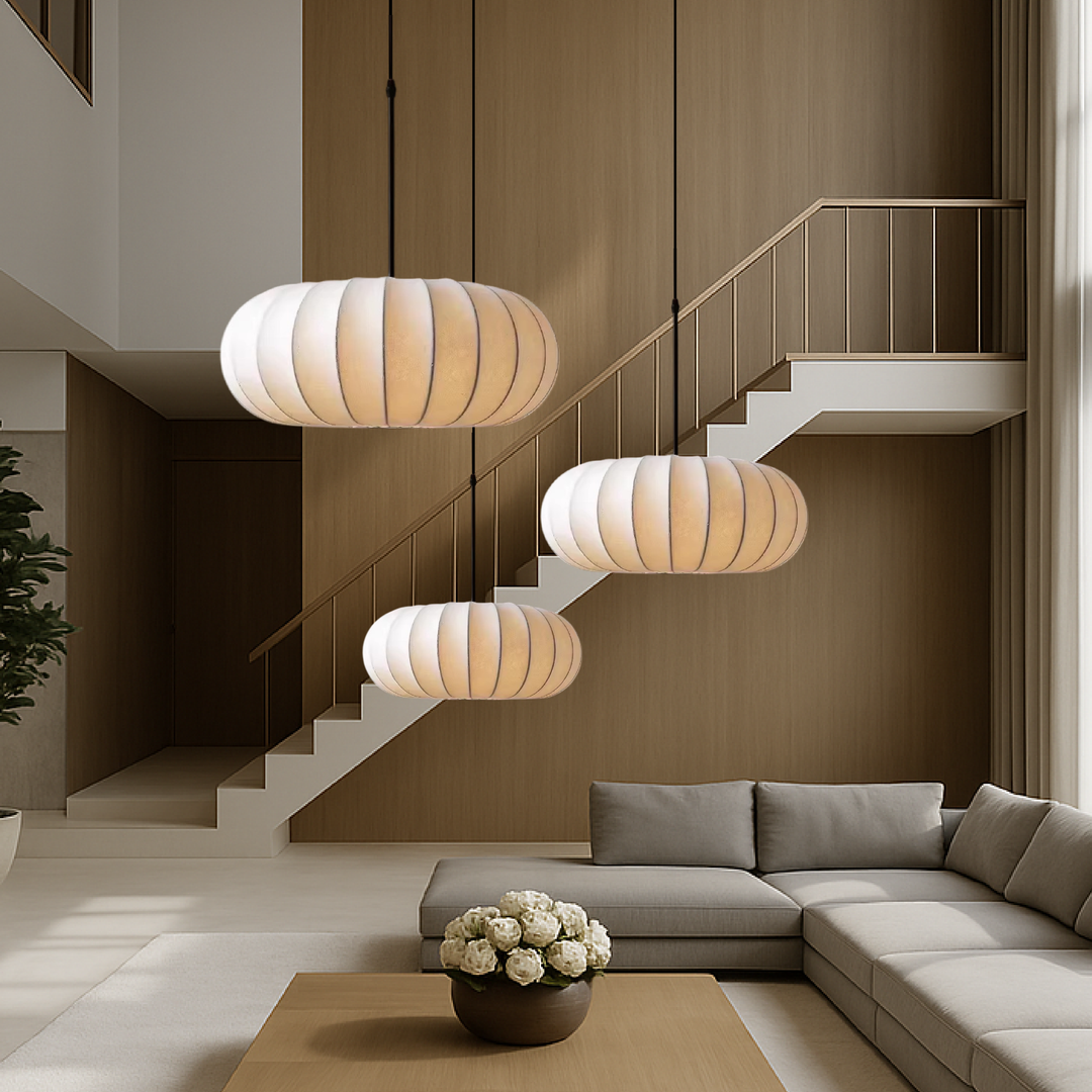 Modern silk pendant lamp casting warm LED ambient light in minimalist dining room