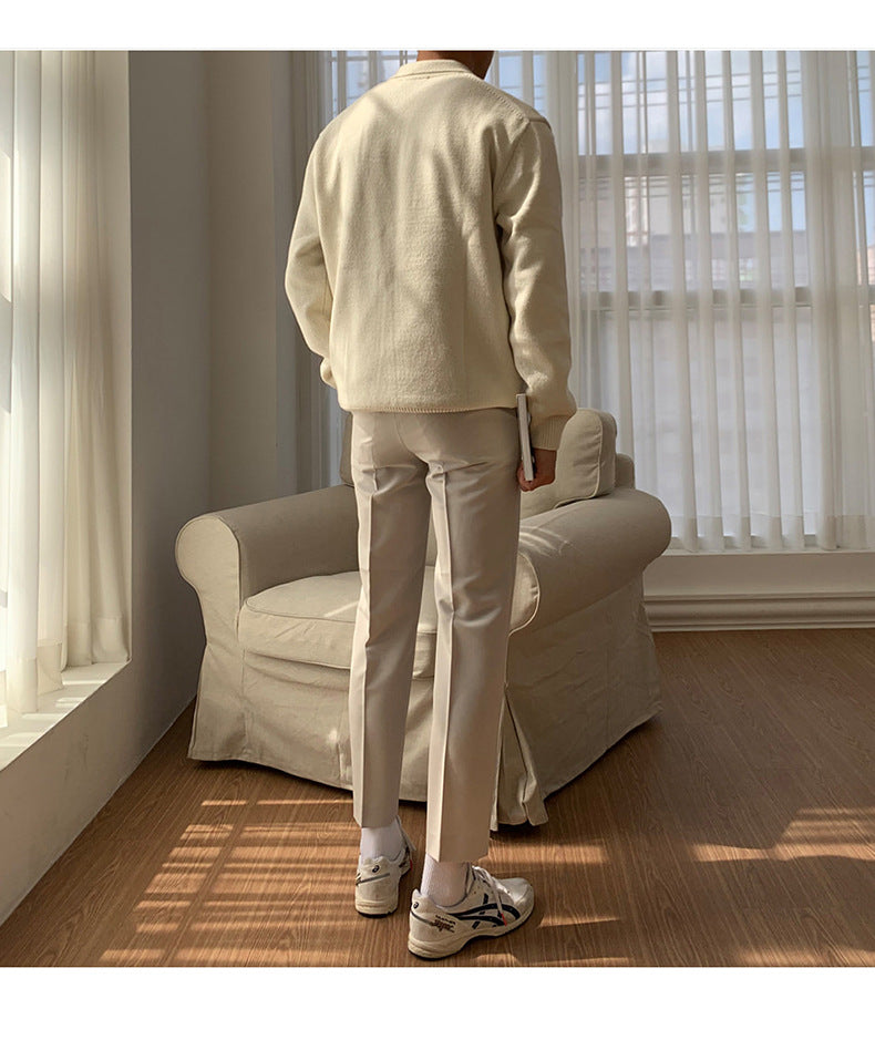 Back view of mens long sleeve button polo sweater showcasing ribbed knit design
