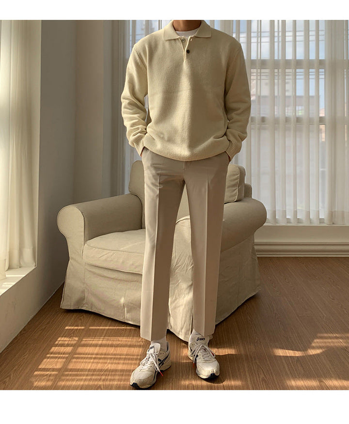 Close up of collar and buttons on mens knit polo sweater for fall fashion