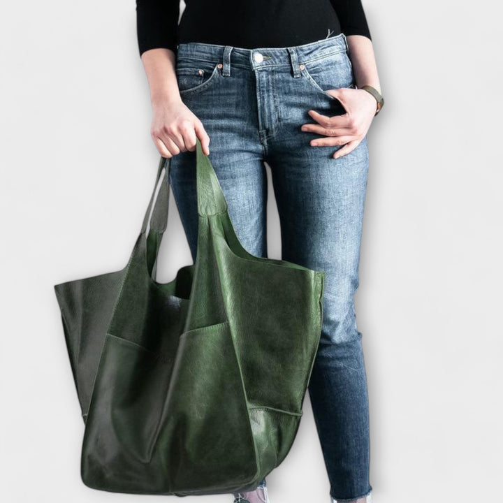 Everyday bag alternative angle highlighting its sleek silhouette and handles.