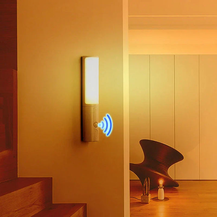 Smart LED Night Light illuminating a hallway automatically with motion sensor