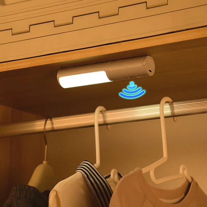 Compact slim LED night light plugged in a modern living room
