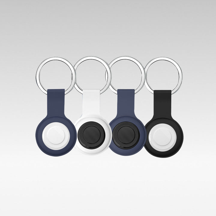 Four colored smart pet GPS tracker holders with keyrings