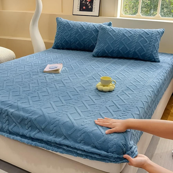 Inviting home decor fleece blanket layered on an armchair