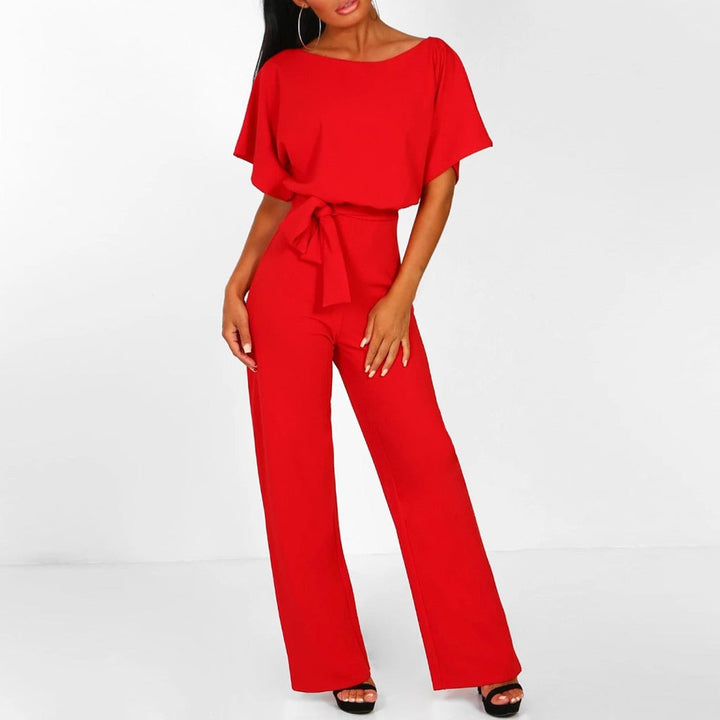 Detailed view of the fabric and belt on an elegant women's jumpsuit