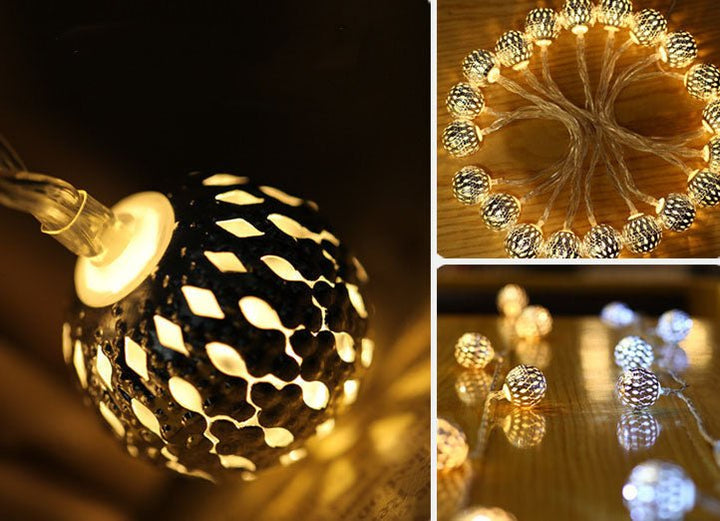 Moroccan style outdoor led string lights illuminating a fence at night