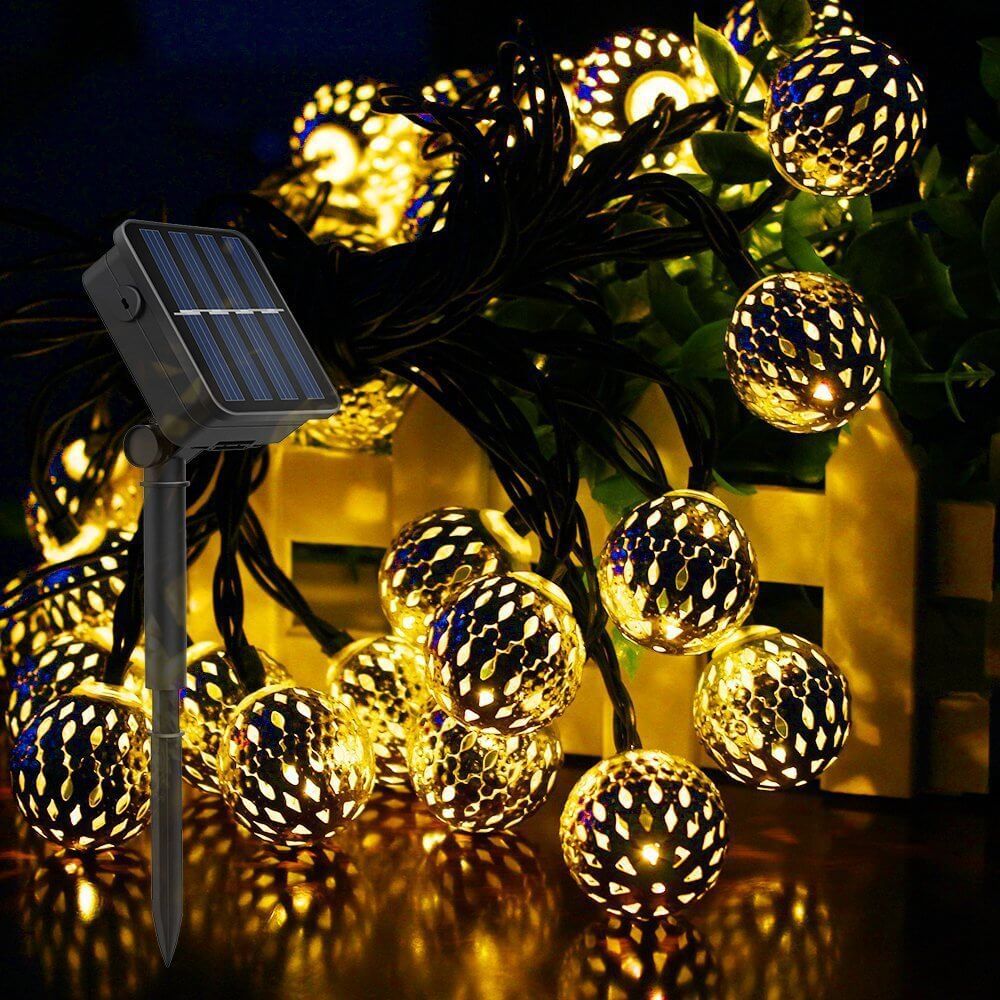 Solar panel and stake setup for outdoor Moroccan garden garland