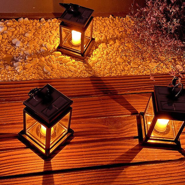 Solar hanging lantern showcasing realistic LED candle effect for garden lighting
