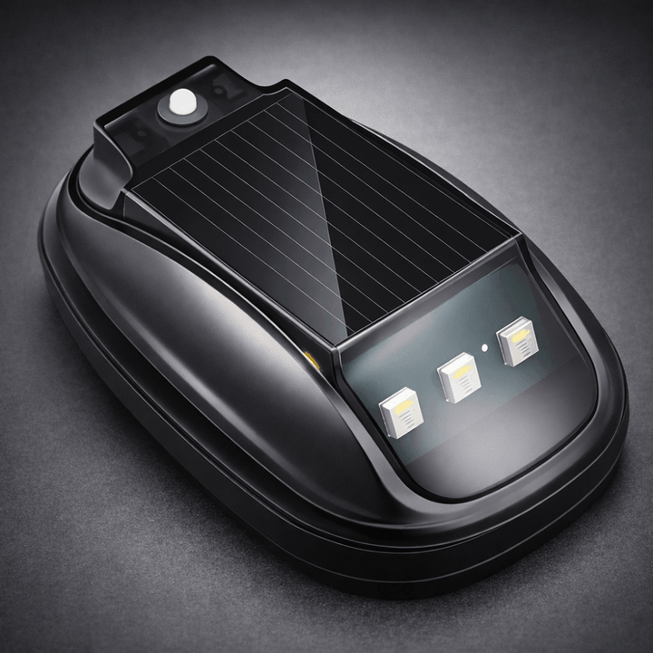 Close-up view of the black solar rock light unit showing the solar panel and control buttons.