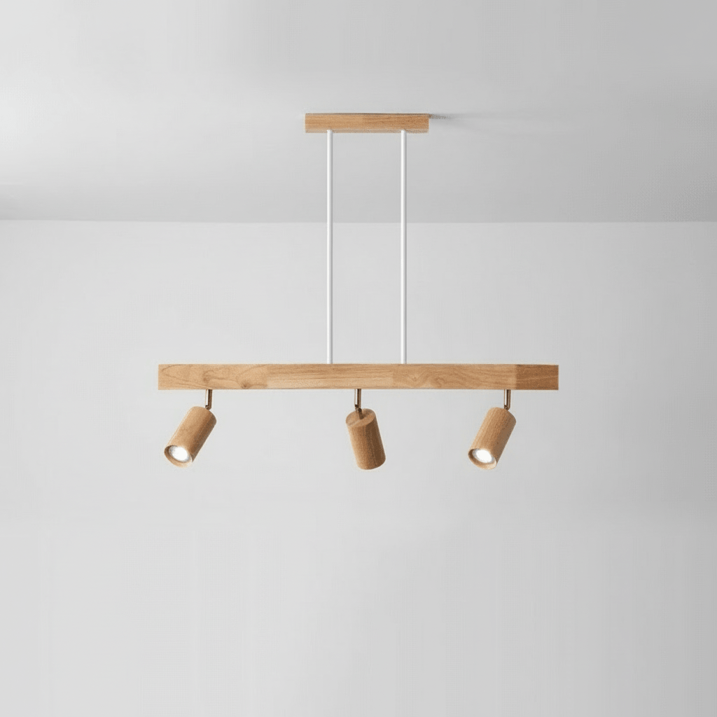Multiple adjustable wooden spotlights mounted on a single track for layered lighting