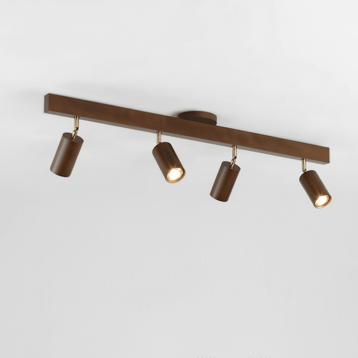 Close-up of minimalist wooden light fixture showcasing natural walnut grain texture