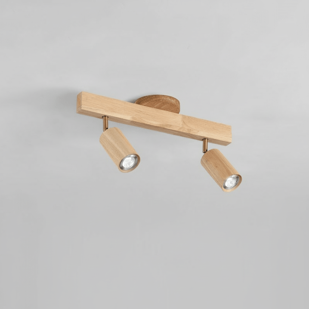 Warm lighting effect cast by adjustable wooden spotlight on a hallway wall