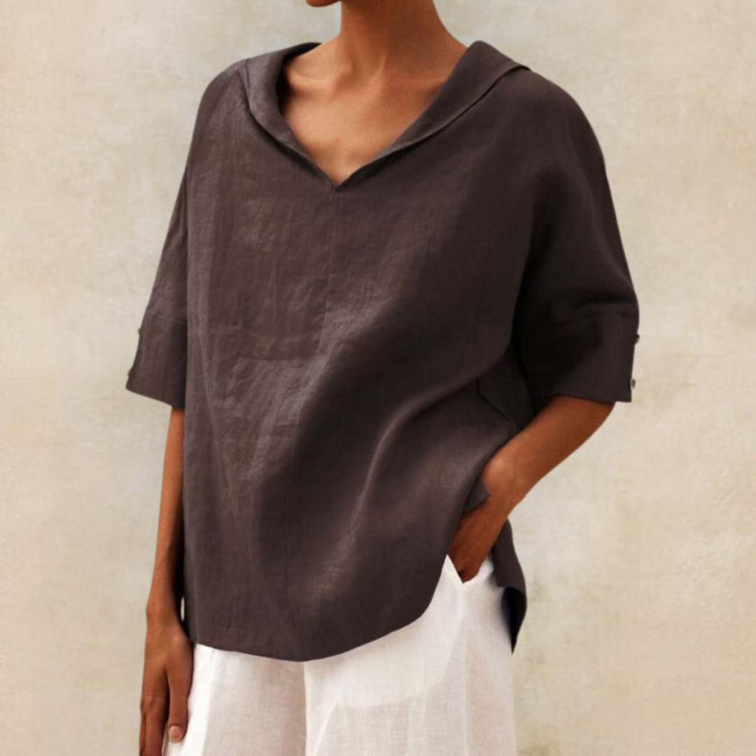 Green v-neck women's top in relaxed fit for casual summer wear