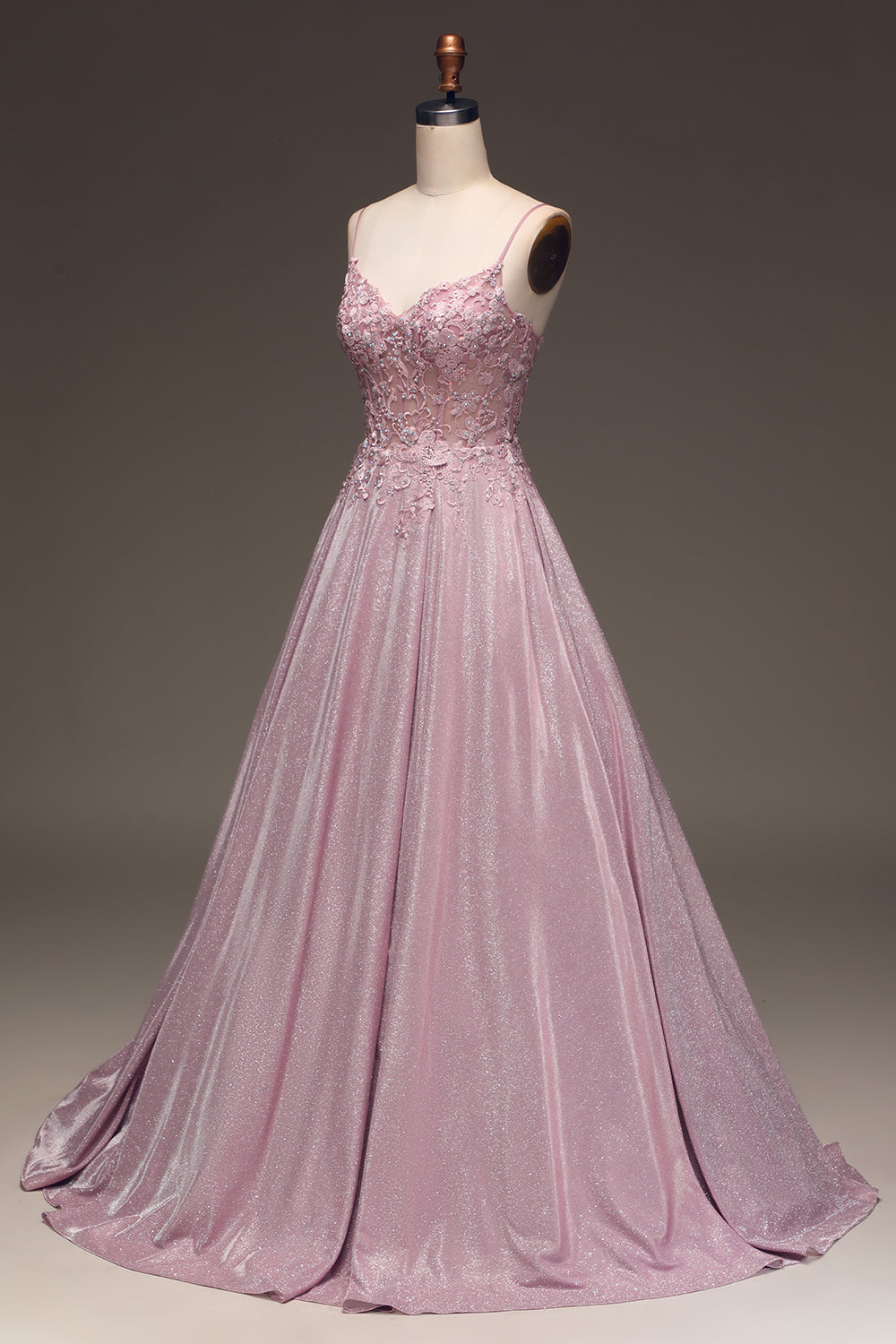 Full length shot of sparkling blush pink wedding guest formal gown
