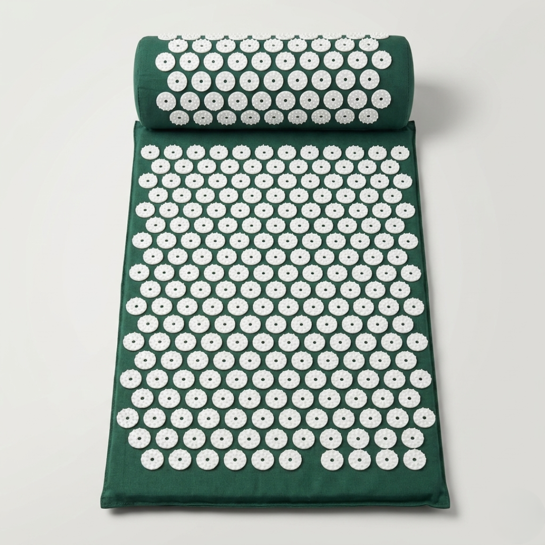 Detailed overhead view of massage mat and matching pillow featuring thousands of relief spikes