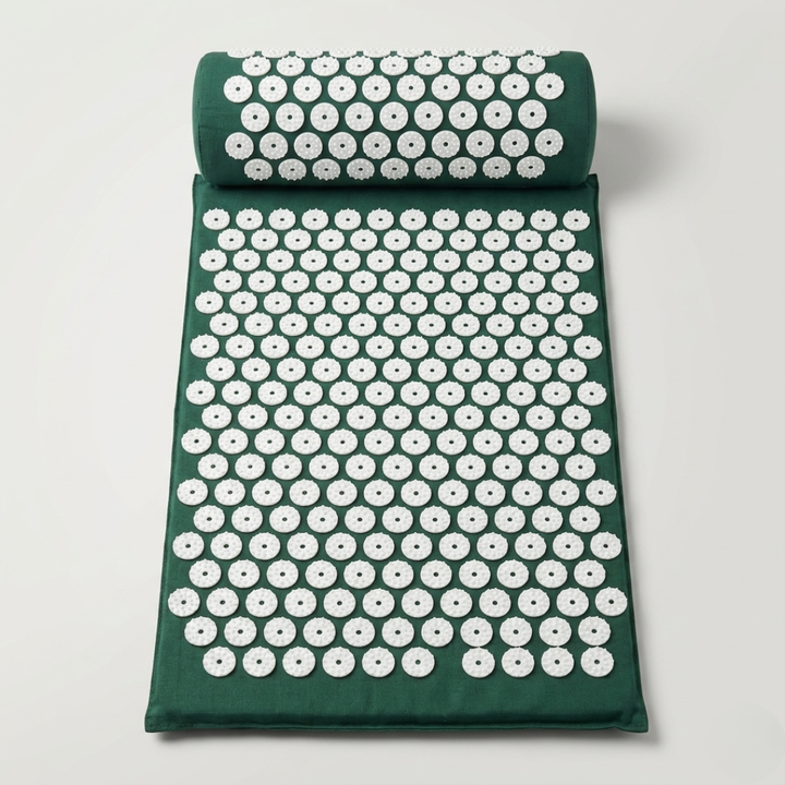 Detailed overhead view of massage mat and matching pillow featuring thousands of relief spikes