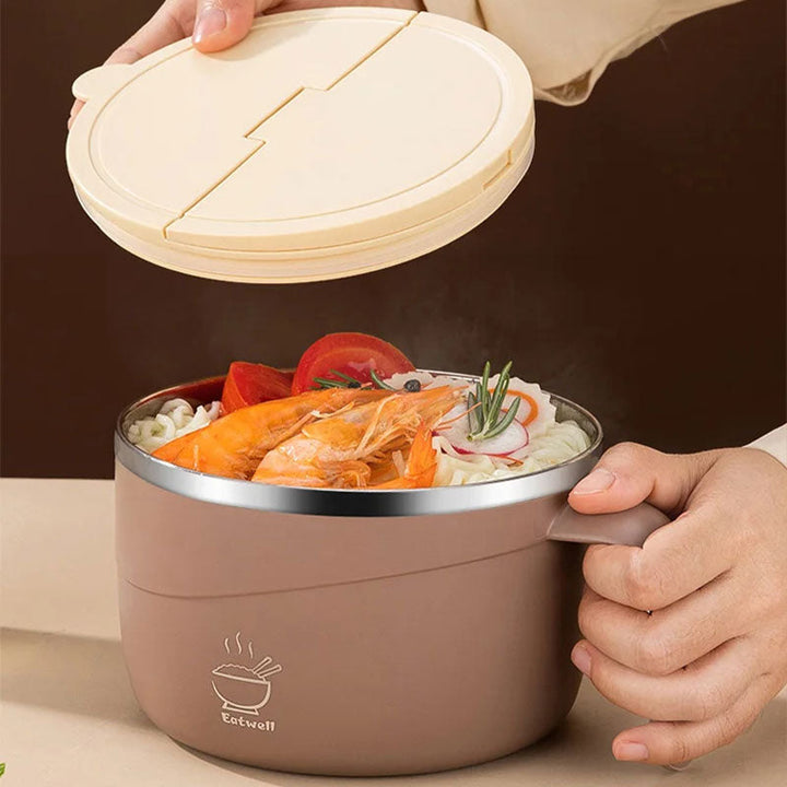 Person opening the lid of a brown stainless steel noodle bowl