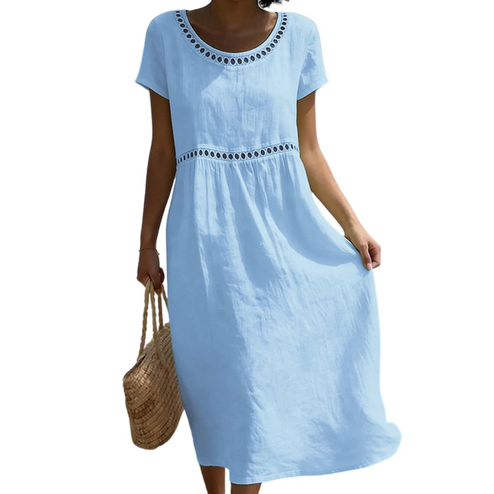 Detailed shot of neckline and short sleeves on elegant women's dress