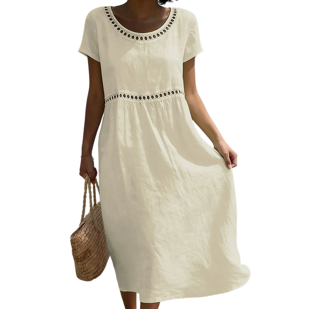 Close-up of hemline and stitching details on casual midi dress for women