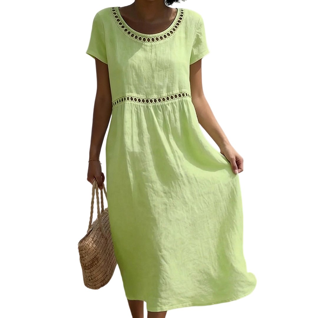 Close-up of premium fabric texture on women's summer midi dress