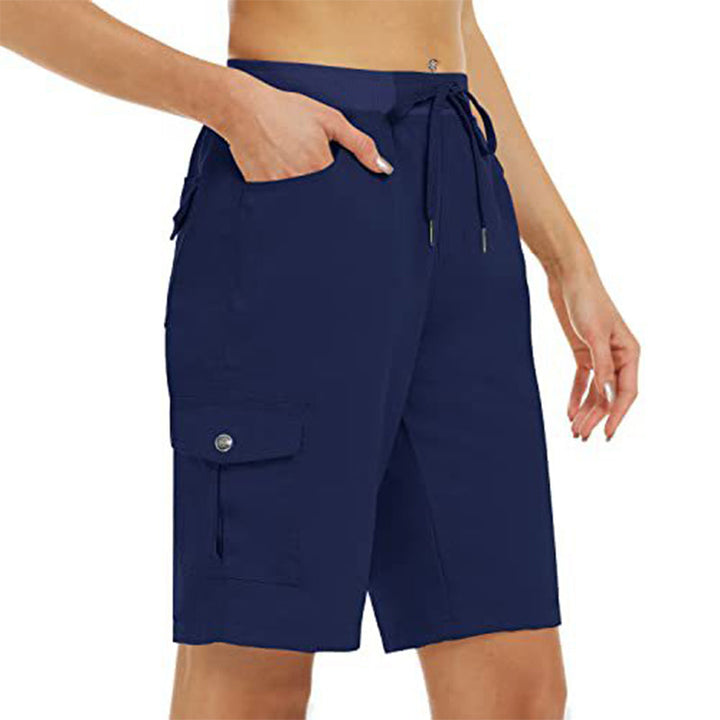 Close-up of secure button flap closure on cargo pocket of womens shorts
