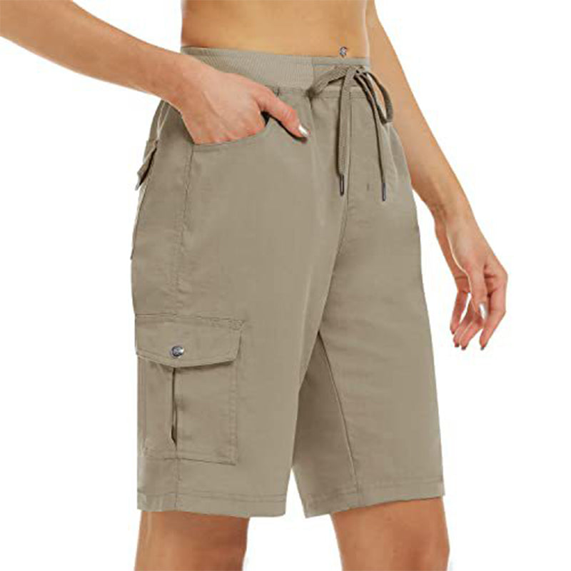Womens beige utility shorts folded neatly to show compact travel packing design