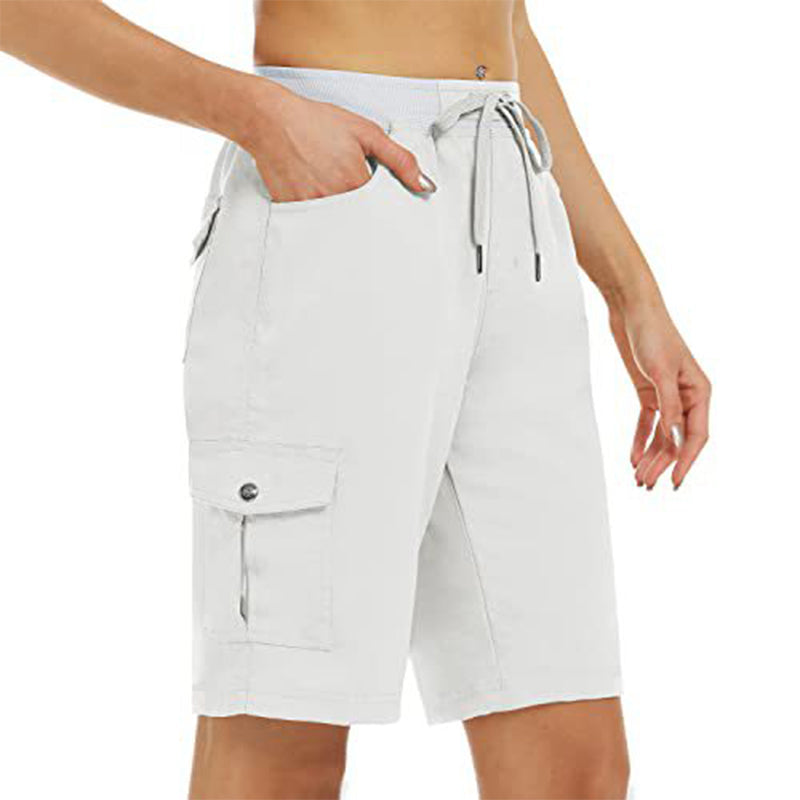 Light grey womens summer shorts designed for travel, hiking, and active lifestyles