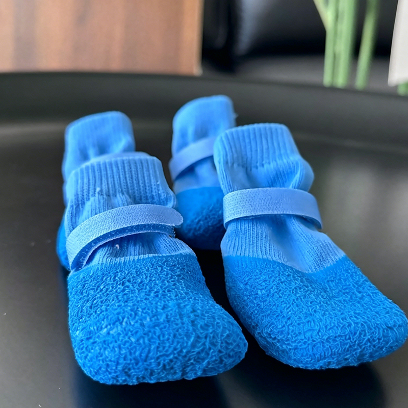 Waterproof non-slip dog shoes for pets, featuring durable soles and breathable mesh upper.
