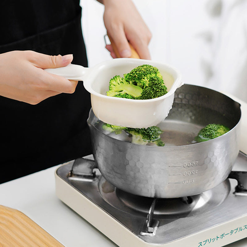 Vegetable strainer with efficient drainage holes for kitchen organization