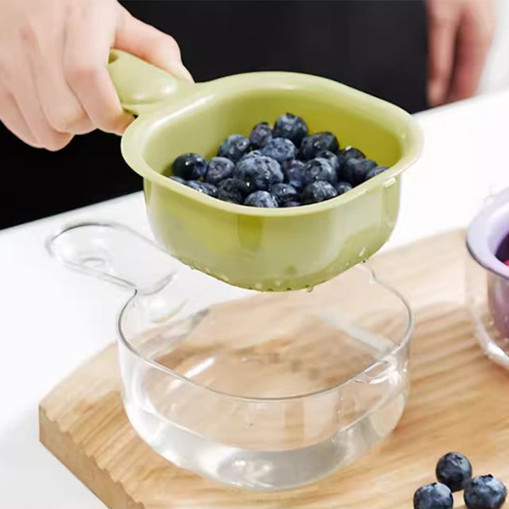 Dual layer colander separated to show inner basket and outer washing bowl